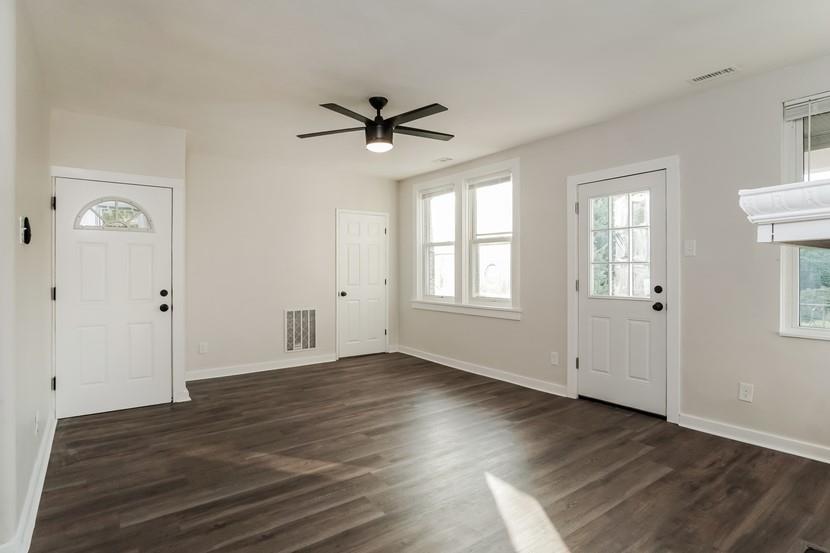6472 Monitor Street Pittsburgh, PA 15217 - Photo 26 of 39 wooden floor in an empty room with a window