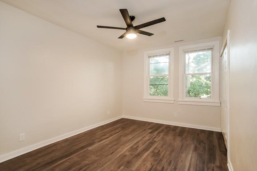 6472 Monitor Street Pittsburgh, PA 15217 - Photo 33 of 39 wooden floor in an empty room with a window