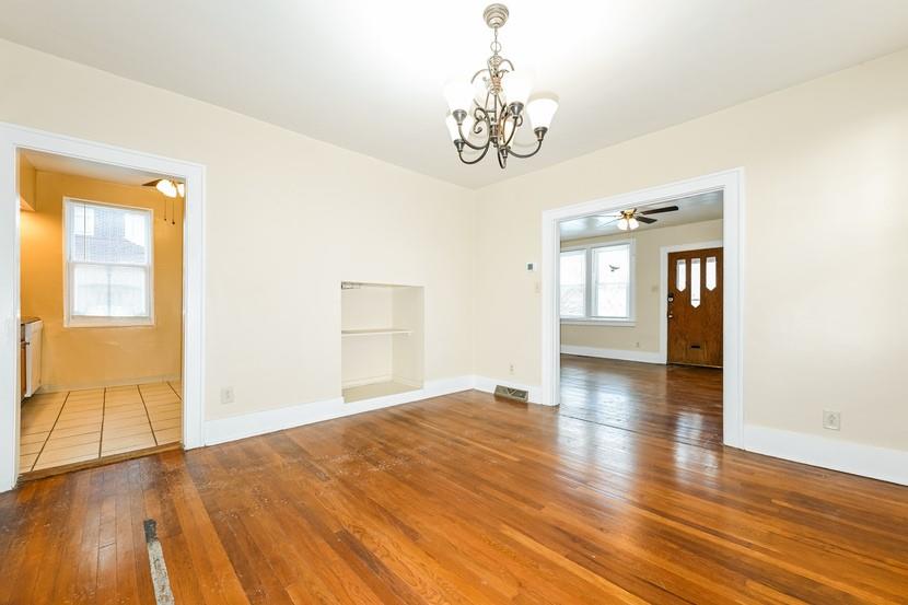 6472 Monitor Street Pittsburgh, PA 15217 - Photo 10 of 39 a view of empty room with wooden floor and fan