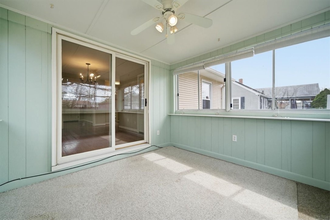 80 Maplecrest Drive Pawtucket, RI 02861 - Photo 26 of 44 With its charming beadboard detail and peaceful backyard views, this versatile space is perfect for morning coffee, a cozy reading nook, or a relaxing sitting area in every season.