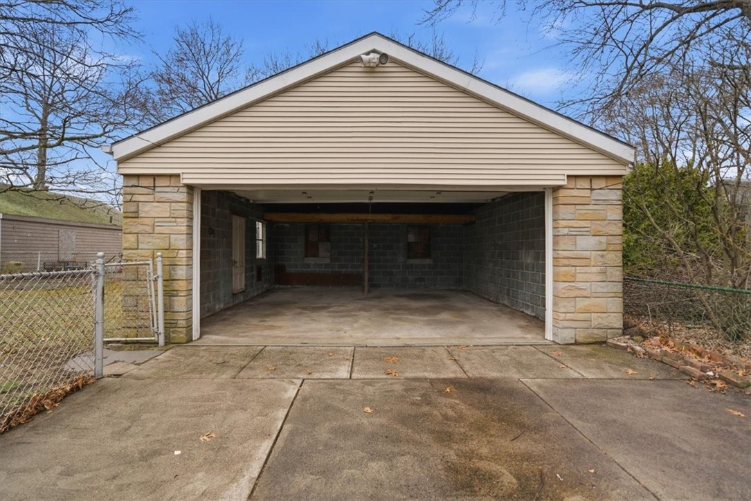 80 Maplecrest Drive Pawtucket, RI 02861 - Photo 38 of 44 With its generous dimensions and easy accessibility, this garage adds tremendous value and versatility—ideal for car enthusiasts, contractors, or anyone needing extra space.