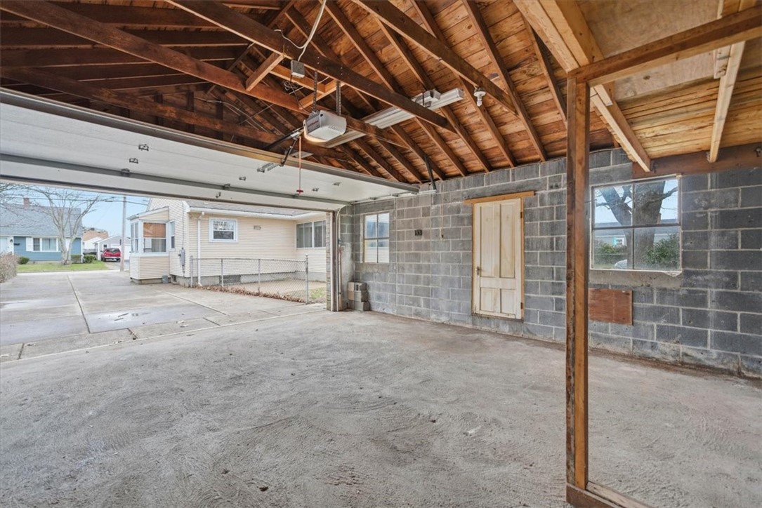 80 Maplecrest Drive Pawtucket, RI 02861 - Photo 39 of 44 Whether you envision a home gym, woodworking space, or year-round project area, the possibilities here are endless. With its generous footprint and easy access, this garage delivers the kind of flexibility and functionality that’s hard to find.