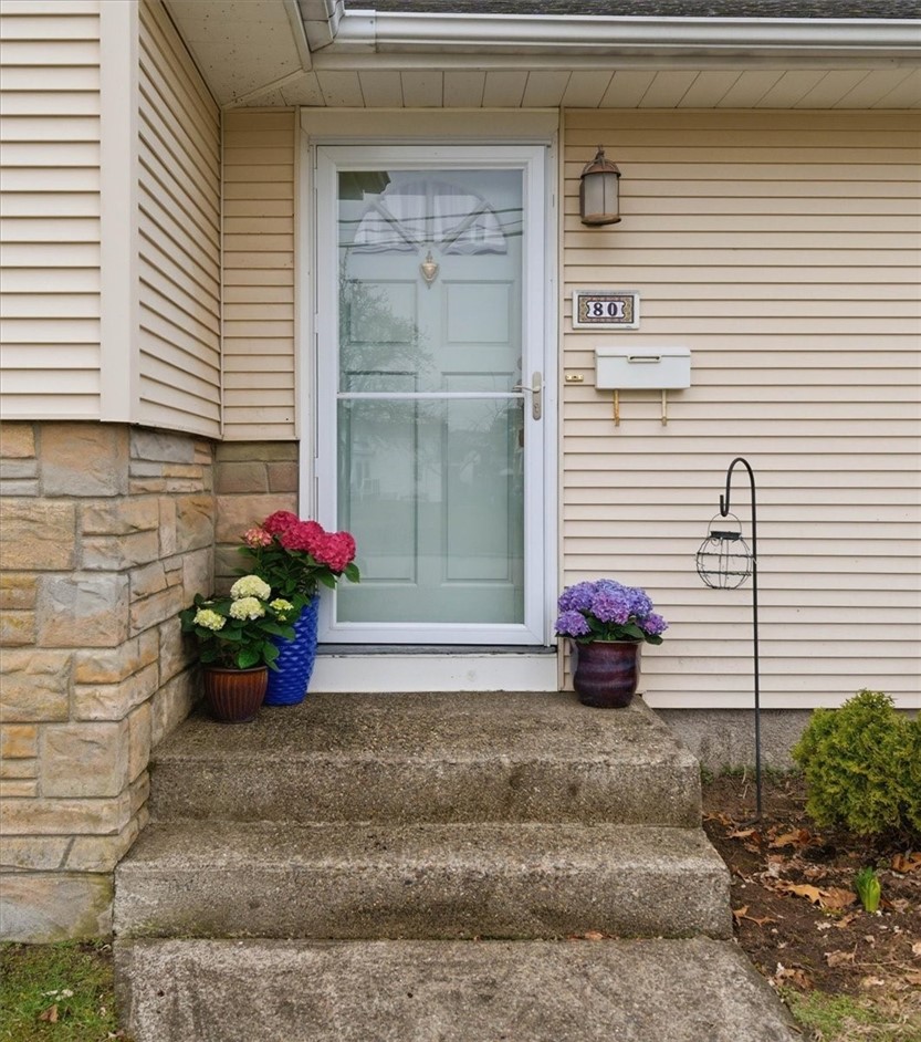 80 Maplecrest Drive Pawtucket, RI 02861 - Photo 6 of 44 Great curb appeal with low maintenance vinyl and pretty stone fascade trim.