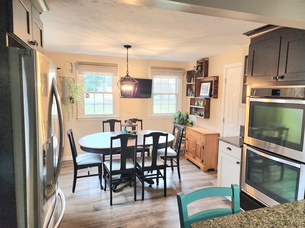 49 Edward Road Townsend, MA 01469 - Photo 11 of 41 a view of a dining room with furniture window and wooden floor