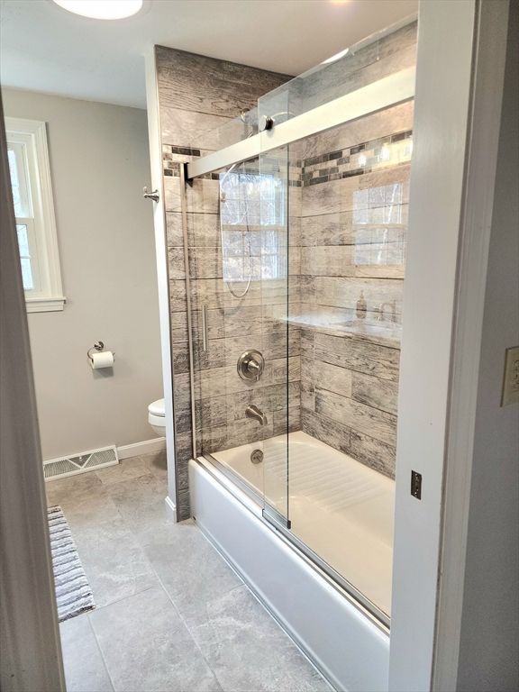 49 Edward Road Townsend, MA 01469 - Photo 15 of 41 a bathroom with a bathtub and a shower