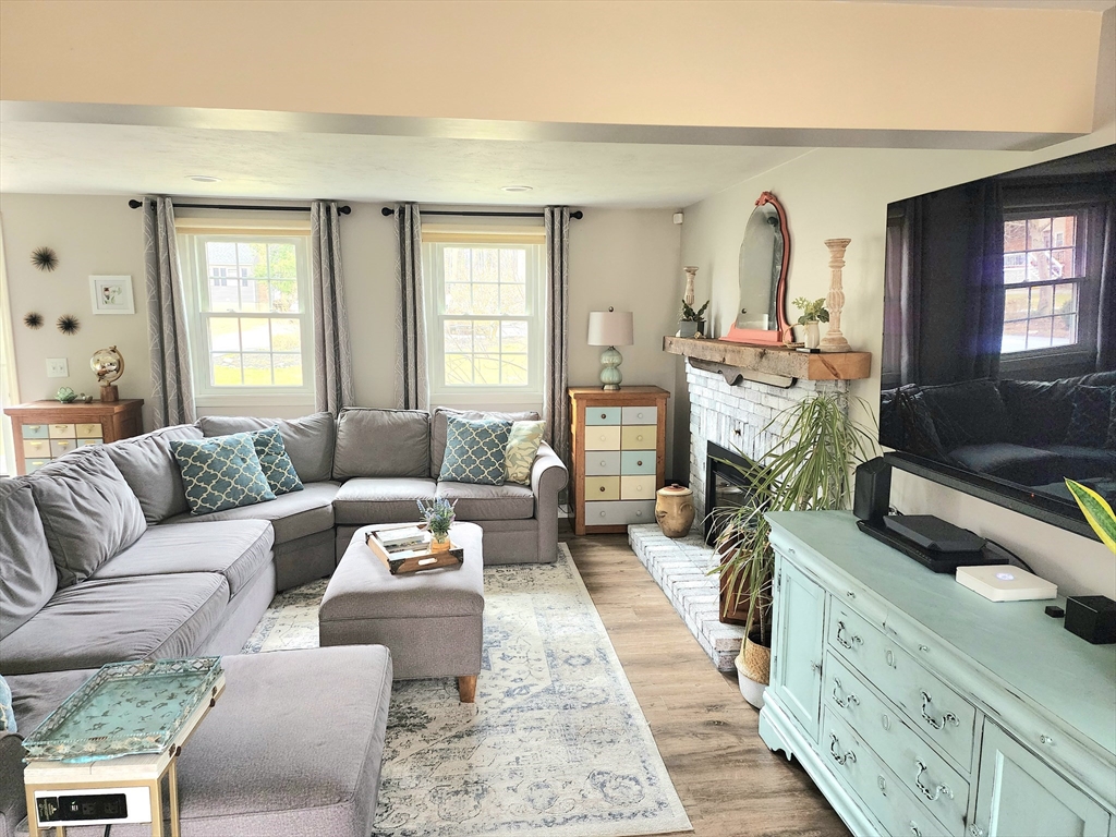 49 Edward Road Townsend, MA 01469 - Photo 20 of 41 a living room with furniture and a flat screen tv
