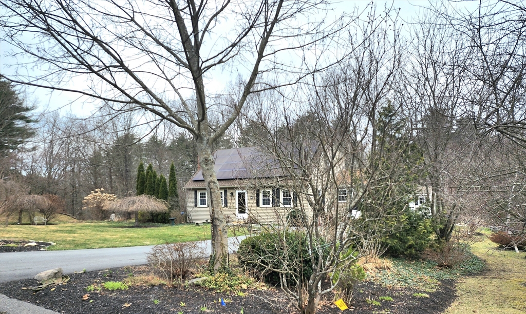 49 Edward Road Townsend, MA 01469 - Photo 2 of 41 a front view of a house with garden