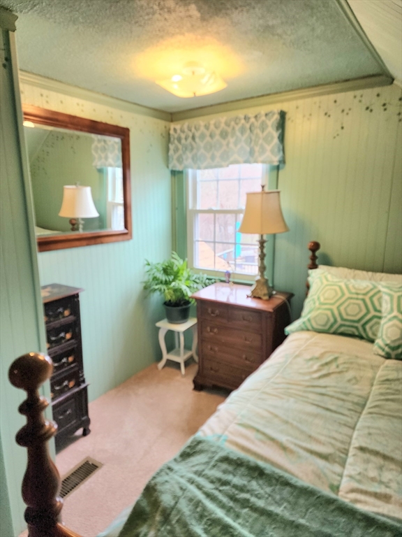 49 Edward Road Townsend, MA 01469 - Photo 30 of 41 a bedroom with a bed and a window