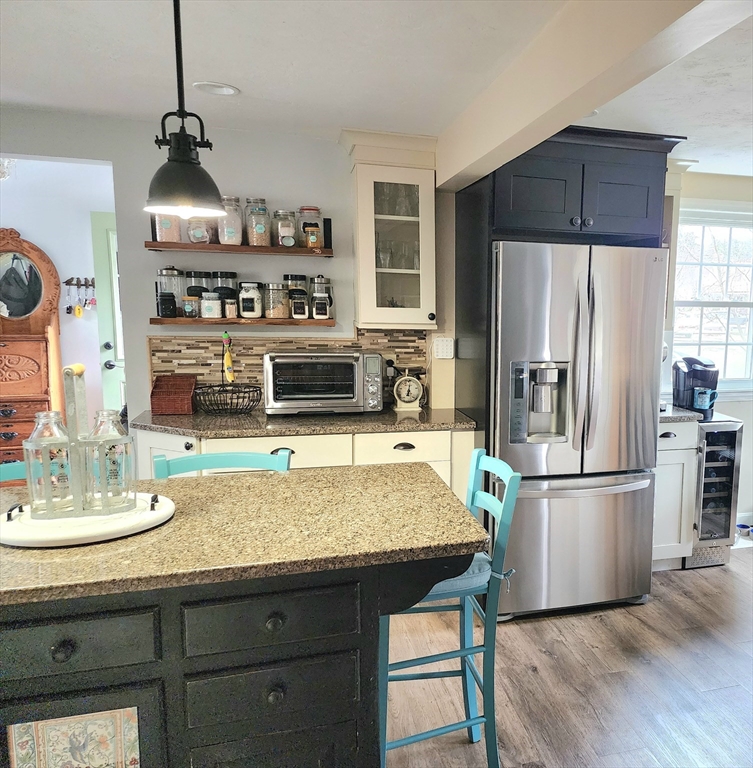 49 Edward Road Townsend, MA 01469 - Photo 8 of 41 a kitchen with stainless steel appliances granite countertop a refrigerator a sink and a stove