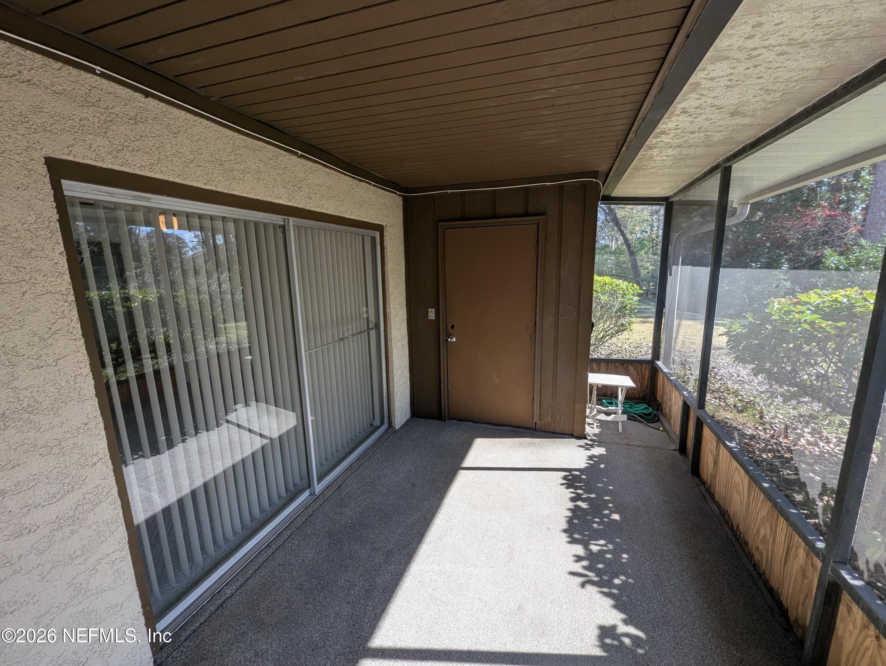 7206 Cypress Cove Road, Unit 14 Jacksonville, FL 32244 - Photo 19 of 23 a view of a porch