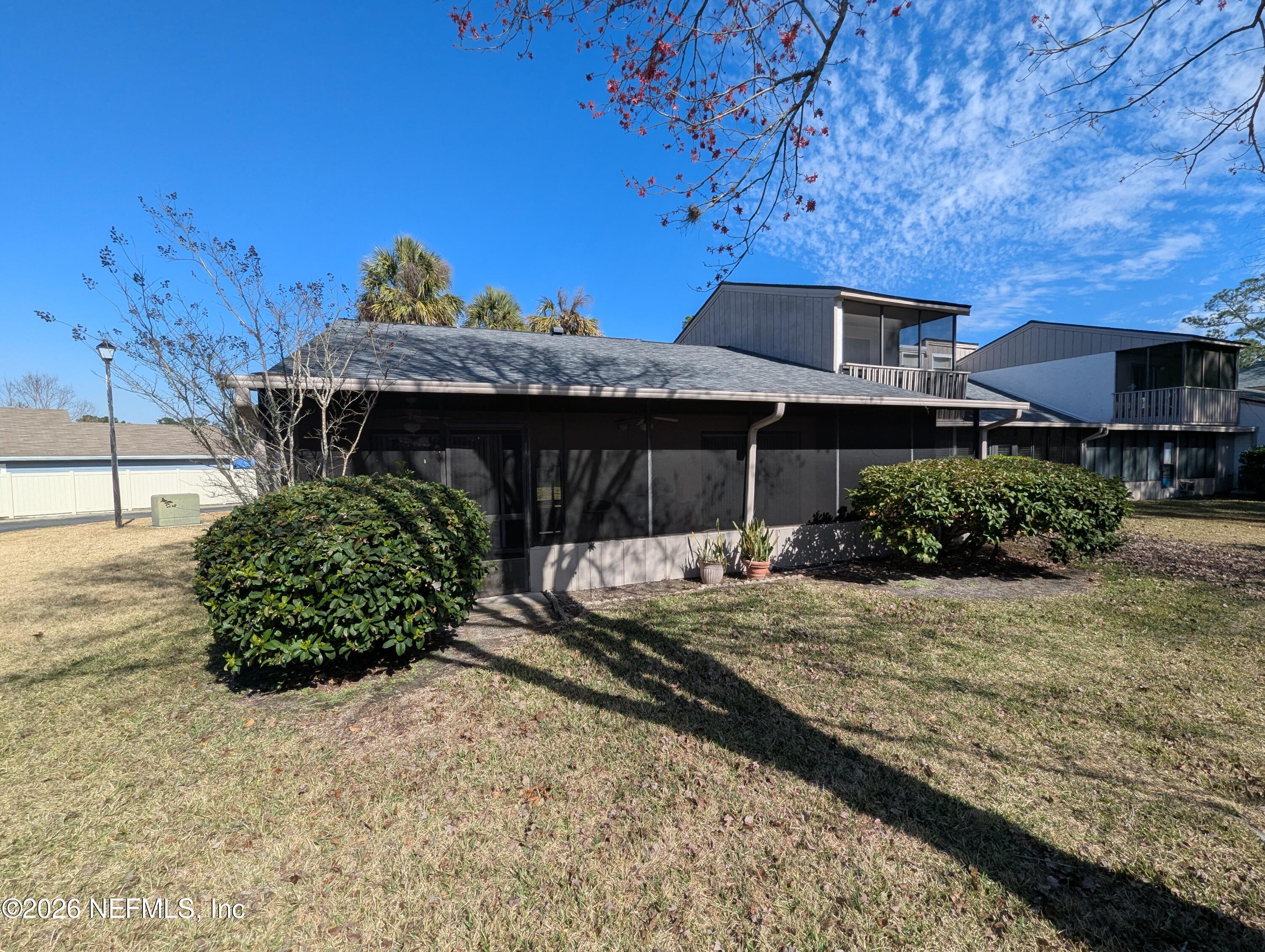 7206 Cypress Cove Road, Unit 14 Jacksonville, FL 32244 - Photo 23 of 23 a front view of a house with garden