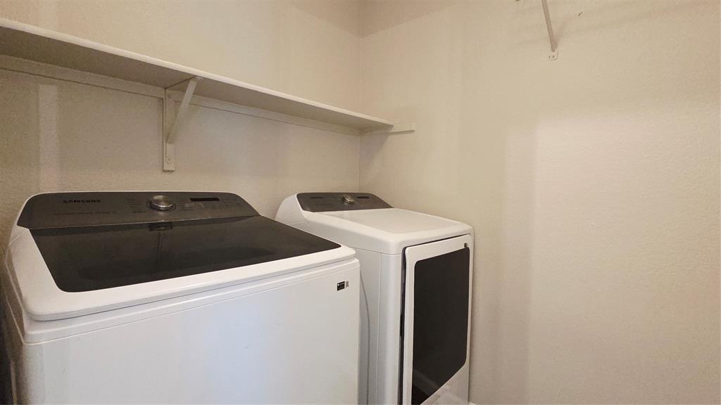 824 Rivers Creek Lane Little Elm, TX 75068 - Photo 4 of 20 a utility room with dryer and washer