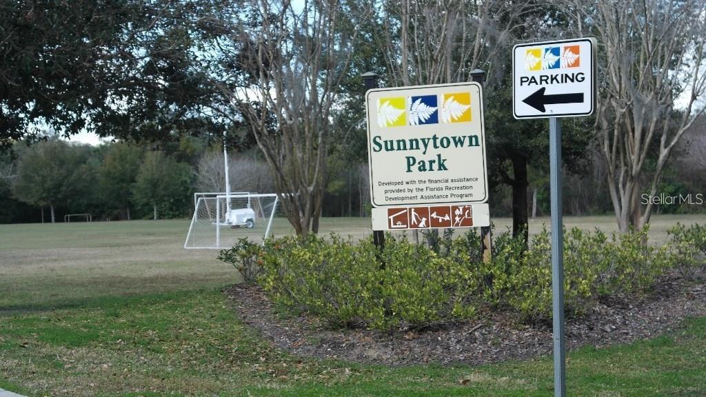 141 Sunnytown Road Casselberry, FL 32707 - Photo 18 of 18 a sign on the side of the road