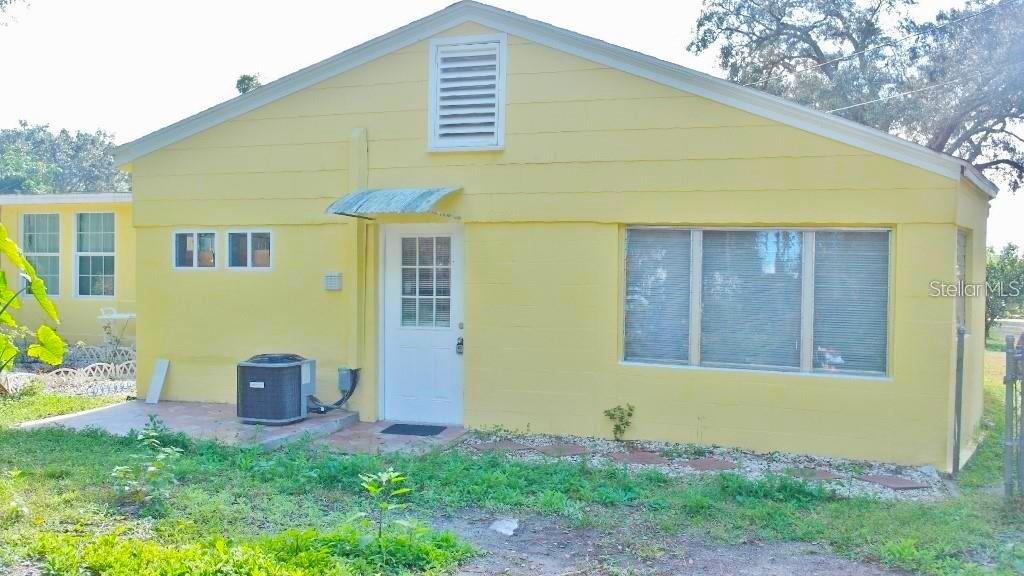 141 Sunnytown Road Casselberry, FL 32707 - Photo 2 of 18 a front view of a house with garden