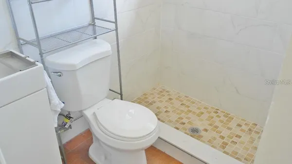 a bathroom with a sink and a toilet