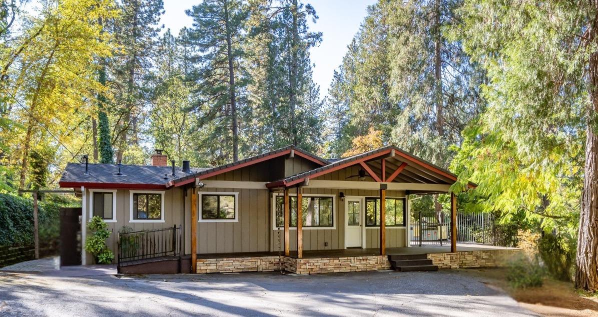 20995 Indian Drive Colfax, CA 95713 - Photo 1 of 1 a front view of a house with a yard