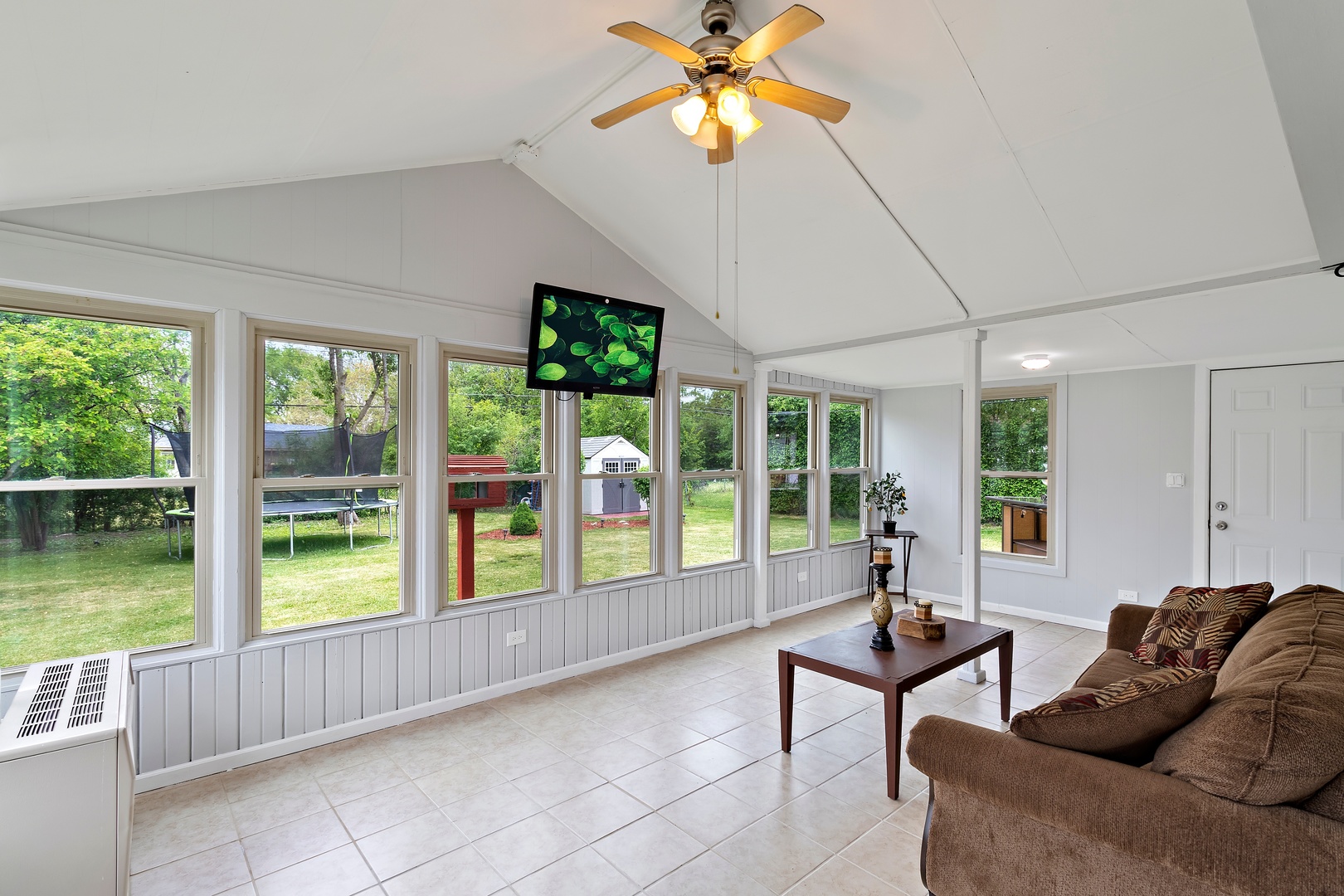 245 Washington Boulevard Hoffman Estates, IL 60169 - Photo 16 of 19 a living room with furniture and a large window