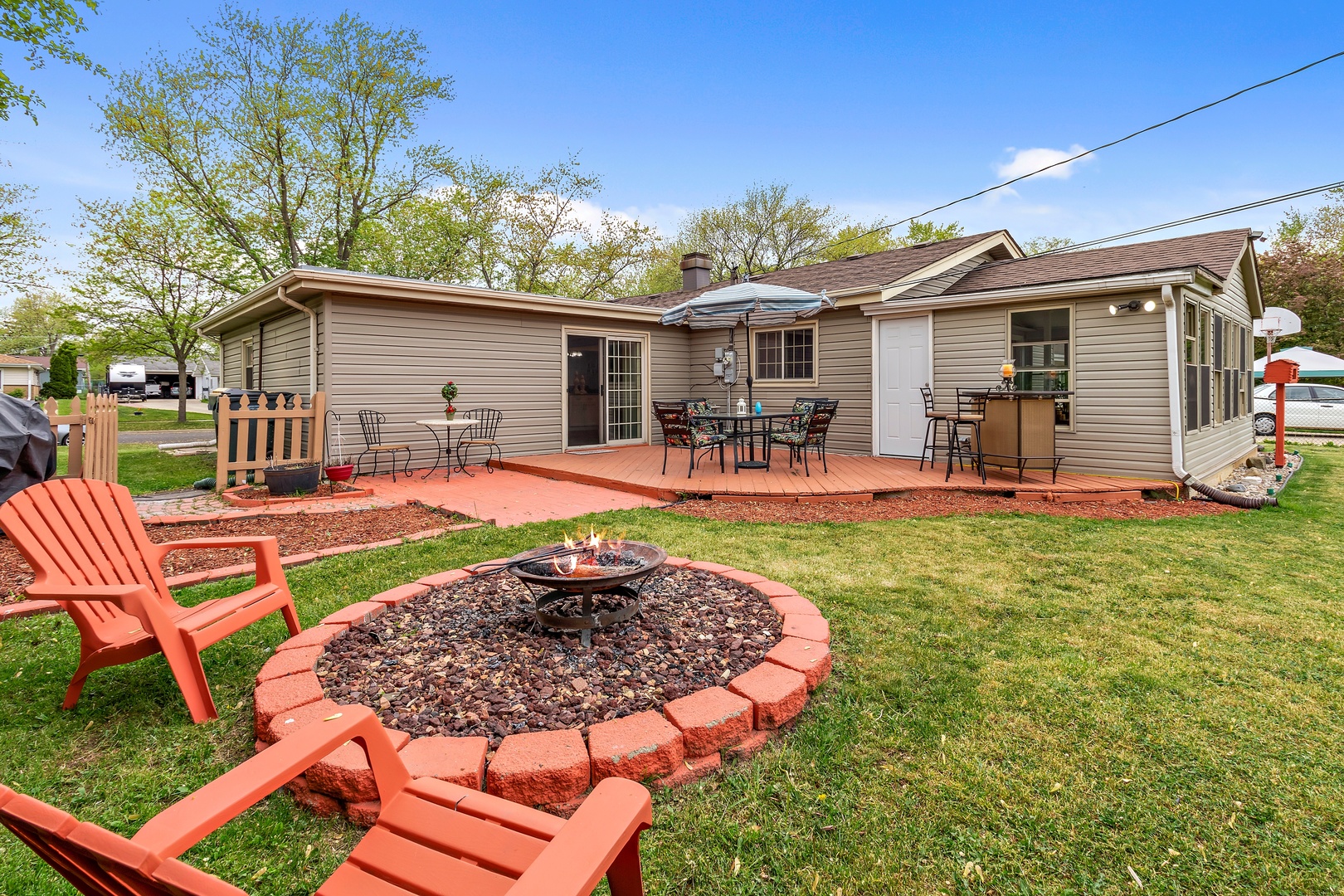 245 Washington Boulevard Hoffman Estates, IL 60169 - Photo 18 of 19 a view of a house with backyard porch and sitting area