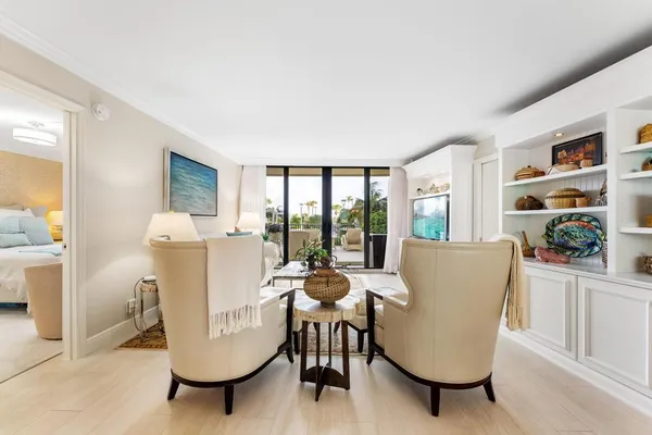 a living room with furniture and a window