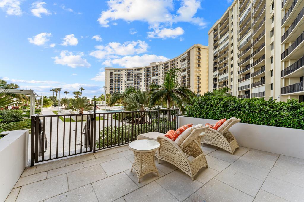 200 Ocean Trail Way, Unit T7 Jupiter, FL 33477 - Photo 35 of 46 a view of city from balcony with seating space