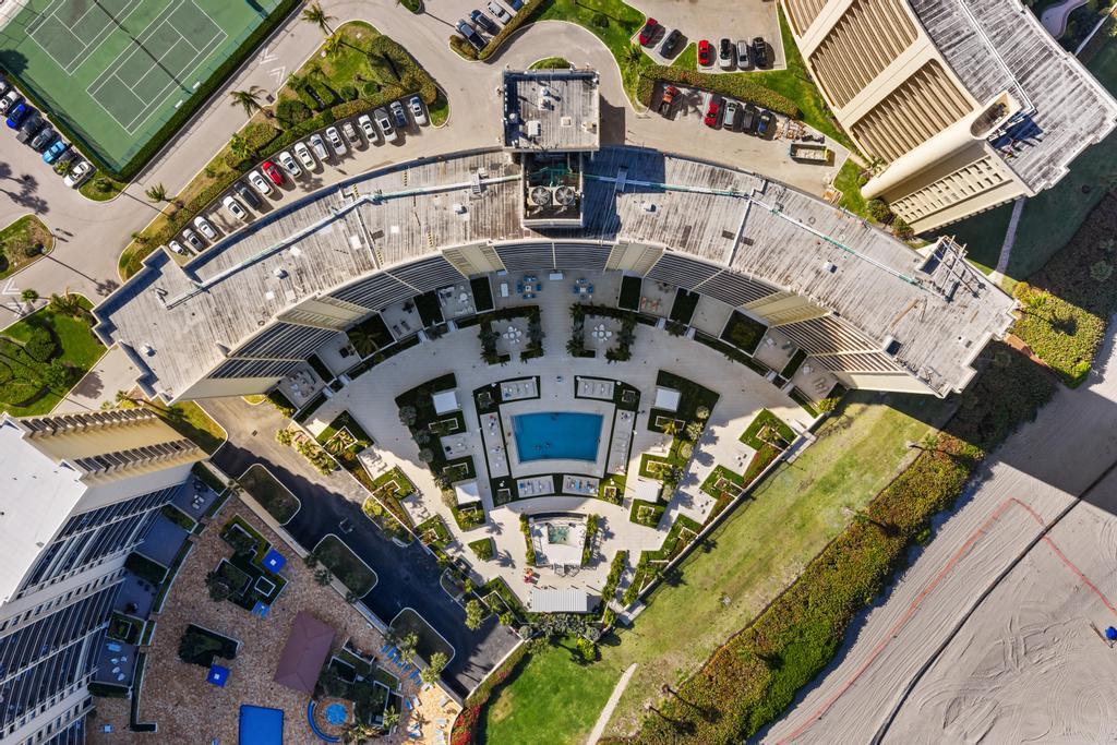 200 Ocean Trail Way, Unit T7 Jupiter, FL 33477 - Photo 38 of 46 a large building with a clock on it