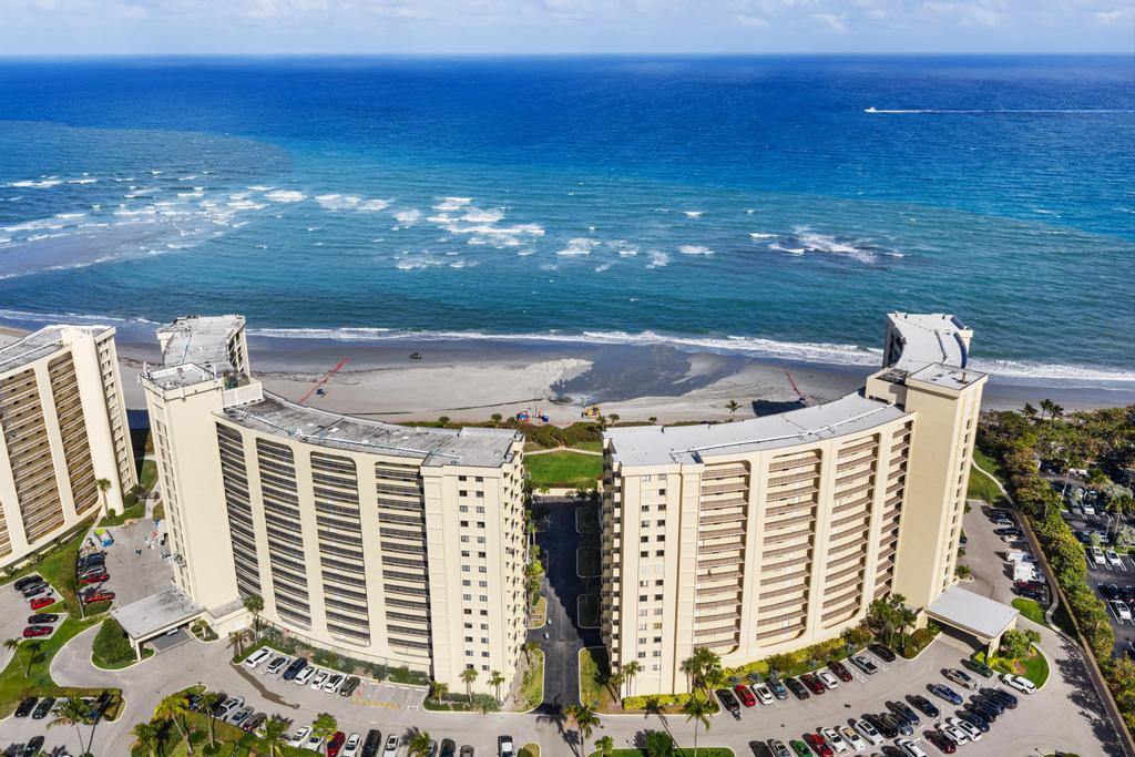 200 Ocean Trail Way, Unit T7 Jupiter, FL 33477 - Photo 43 of 46 a view of building with an ocean view