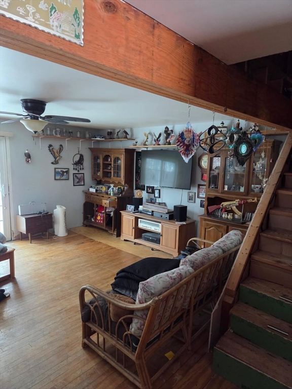 1578 Greenville Road Ashby, MA 01431 - Photo 8 of 17 a outdoor living space with furniture and flat screen tv