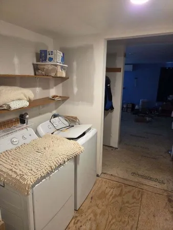 a kitchen that has a sink and a stove