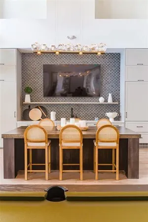 a view of swimming pool with lawn chairs