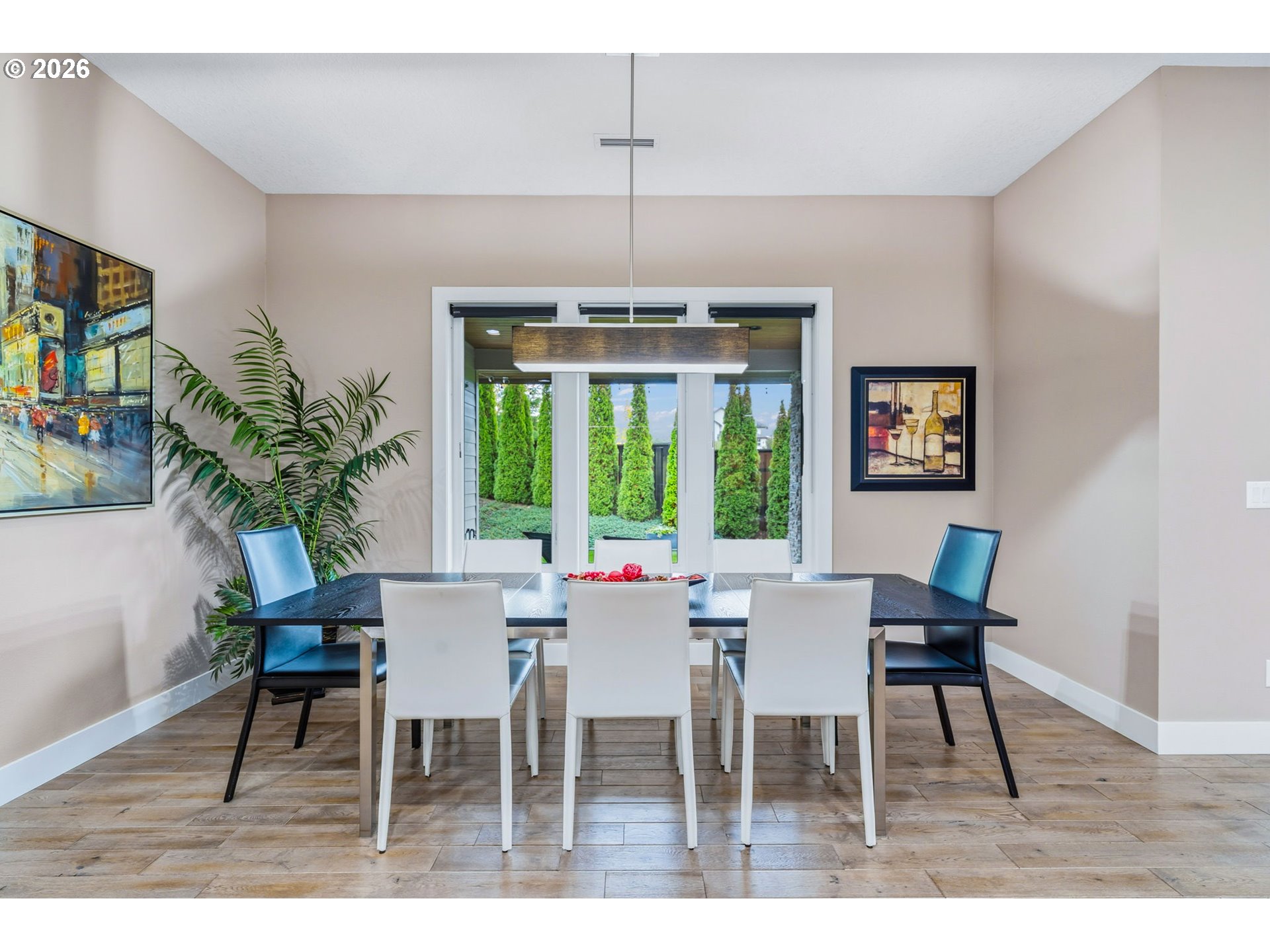 1203 South Great Blue Road Ridgefield, WA 98642 - Photo 17 of 48 a view of a dining room with furniture window and wooden floor