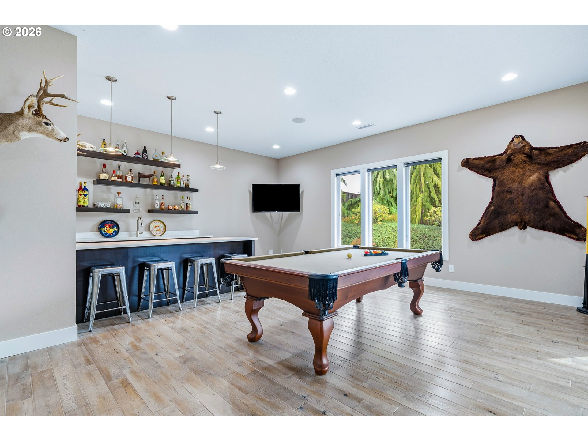 1203 South Great Blue Road Ridgefield, WA 98642 - Photo 19 of 48 a living room with furniture and a wooden floor