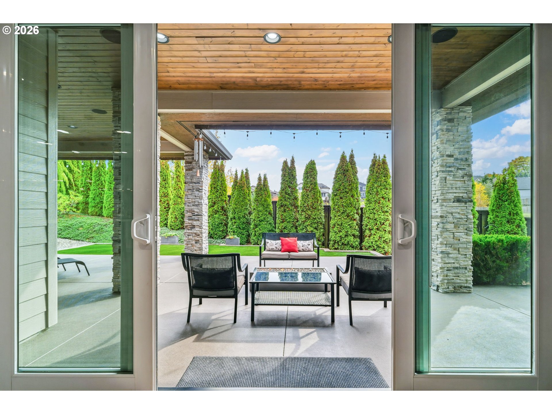 1203 South Great Blue Road Ridgefield, WA 98642 - Photo 37 of 48 a sitting area with furniture and a large window
