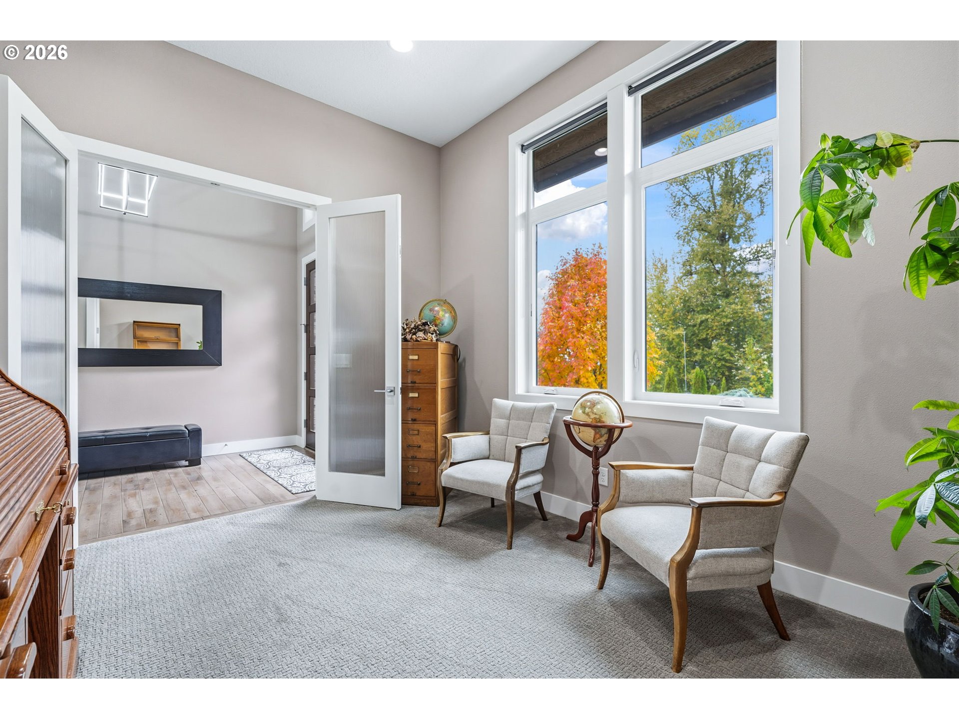 1203 South Great Blue Road Ridgefield, WA 98642 - Photo 6 of 48 a living room with furniture and a large window