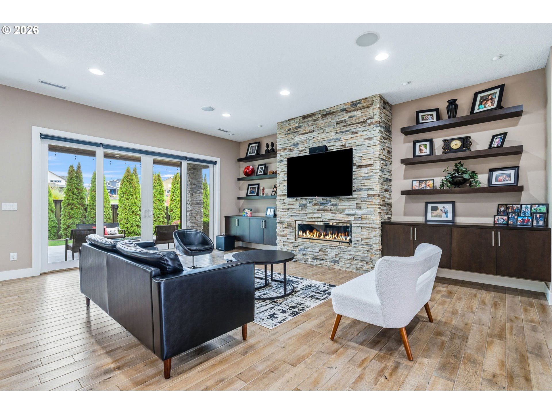 1203 South Great Blue Road Ridgefield, WA 98642 - Photo 7 of 48 a living room with furniture and a flat screen tv