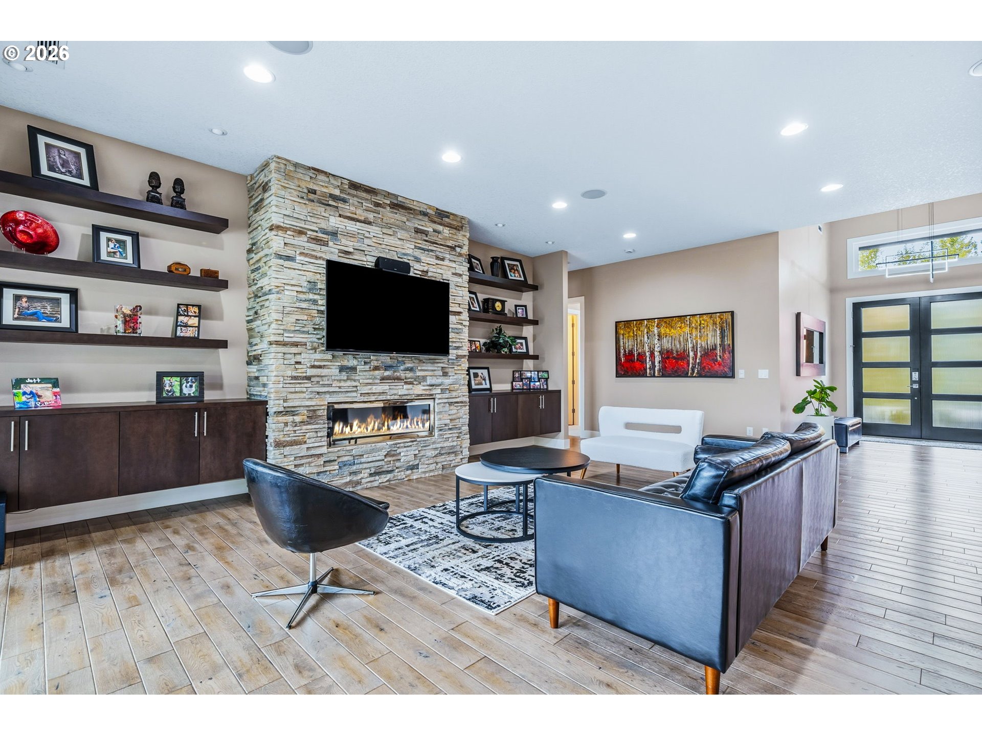 1203 South Great Blue Road Ridgefield, WA 98642 - Photo 8 of 48 a living room with furniture and a flat screen tv