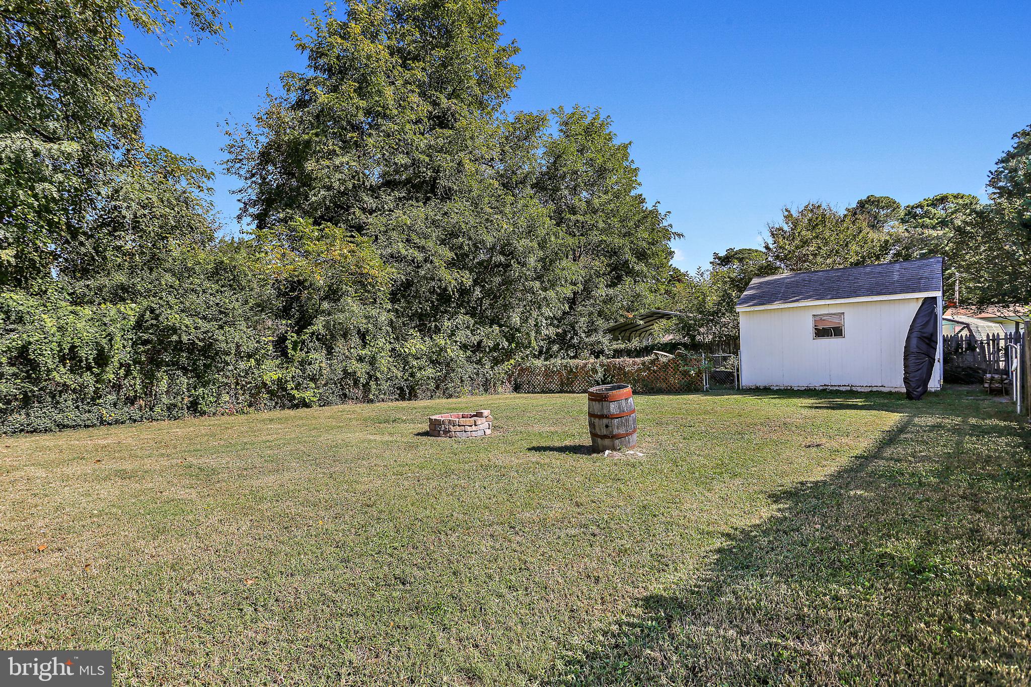 17412 Audrey Road Cobb Island, MD 20625 - Photo 26 of 28 Fully Fenced Backyard w/ Storage Shed
