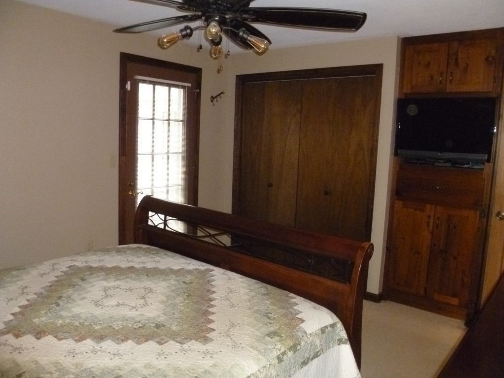 1209 Amostown Road West Springfield, MA 01089 - Photo 11 of 29 a bedroom with a bed and a window