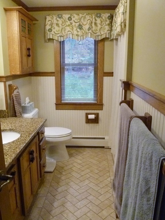 1209 Amostown Road West Springfield, MA 01089 - Photo 13 of 29 a bathroom with a granite countertop sink toilet and shower