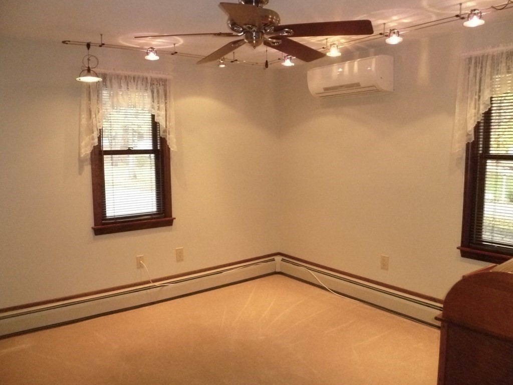 1209 Amostown Road West Springfield, MA 01089 - Photo 15 of 29 a view of an empty room with a window