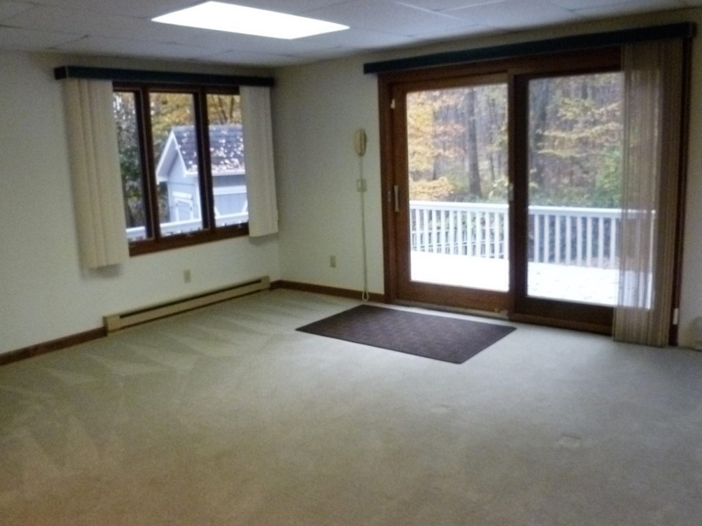 1209 Amostown Road West Springfield, MA 01089 - Photo 19 of 29 a view of an empty room with a window