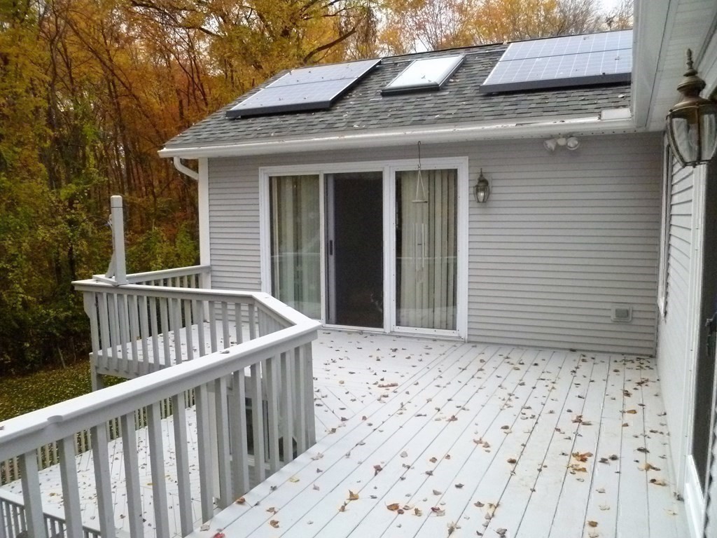 1209 Amostown Road West Springfield, MA 01089 - Photo 23 of 29 a view of a house with wooden fence