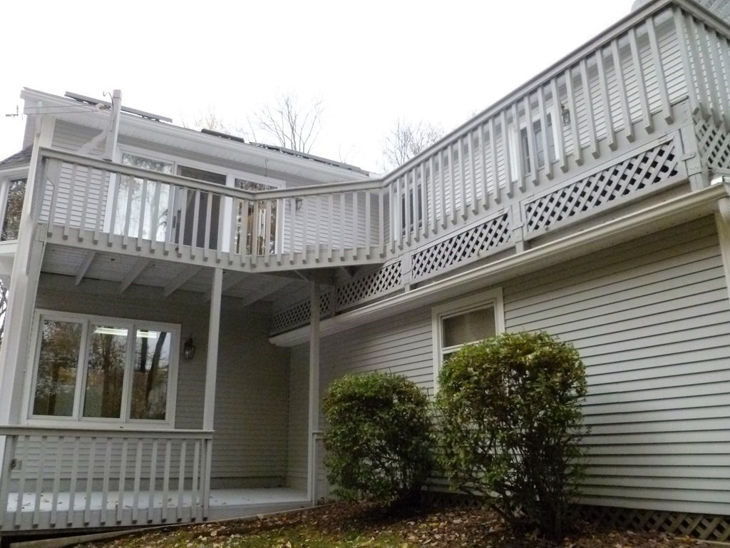 1209 Amostown Road West Springfield, MA 01089 - Photo 24 of 29 a view of a house with wooden fence
