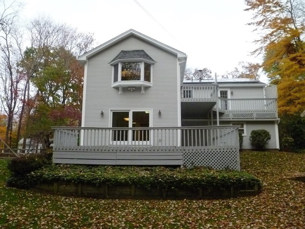 1209 Amostown Road West Springfield, MA 01089 - Photo 25 of 29 a front view of a house with a garden