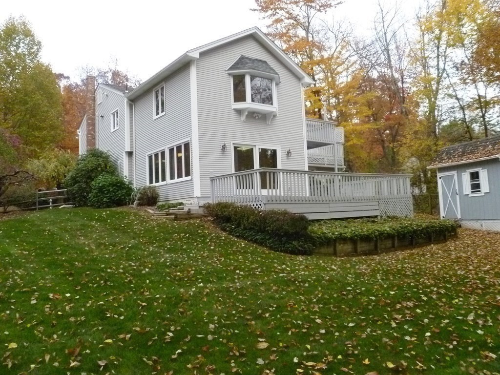 1209 Amostown Road West Springfield, MA 01089 - Photo 26 of 29 a front view of a house with a yard