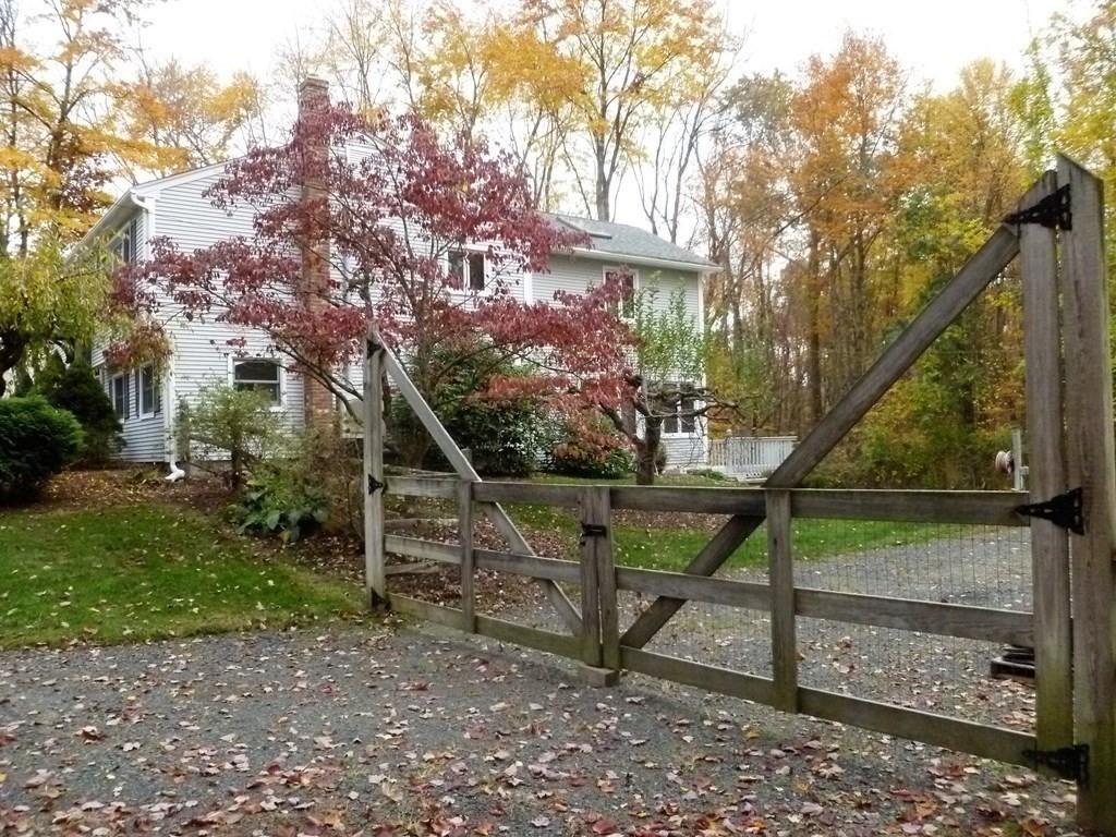 1209 Amostown Road West Springfield, MA 01089 - Photo 28 of 29 a view of a bench in a garden