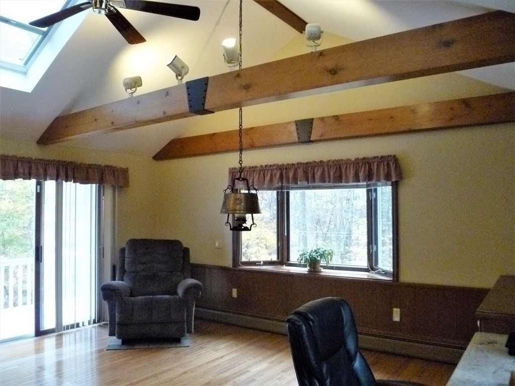 1209 Amostown Road West Springfield, MA 01089 - Photo 7 of 29 a living room with furniture and a window