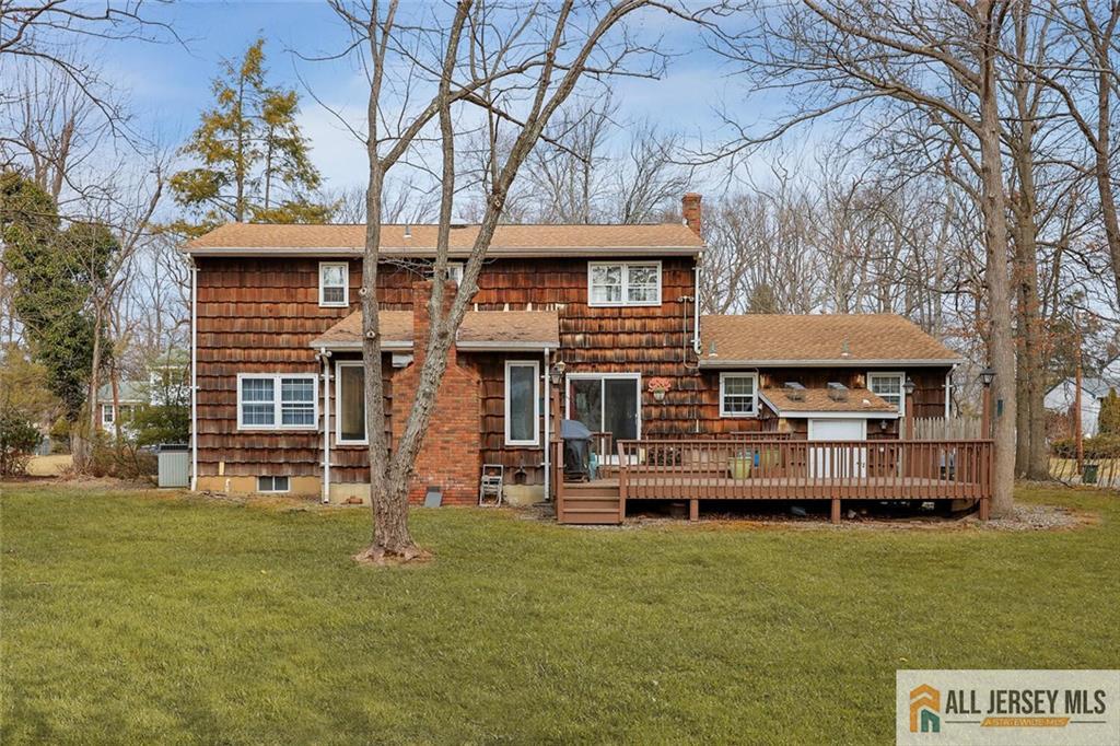 9 Woodruff Road Edison, NJ 08820 - Photo 36 of 39 a front view of a house with a garden