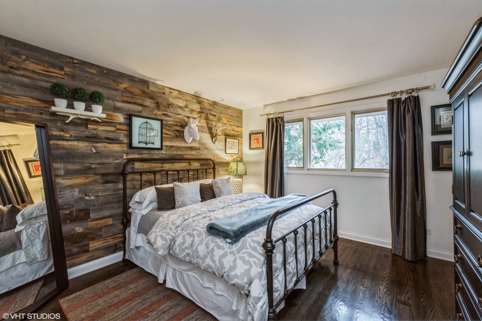 6208 Katmai Trail McHenry, IL 60050 - Photo 15 of 24 a bedroom with a bed next to a large window