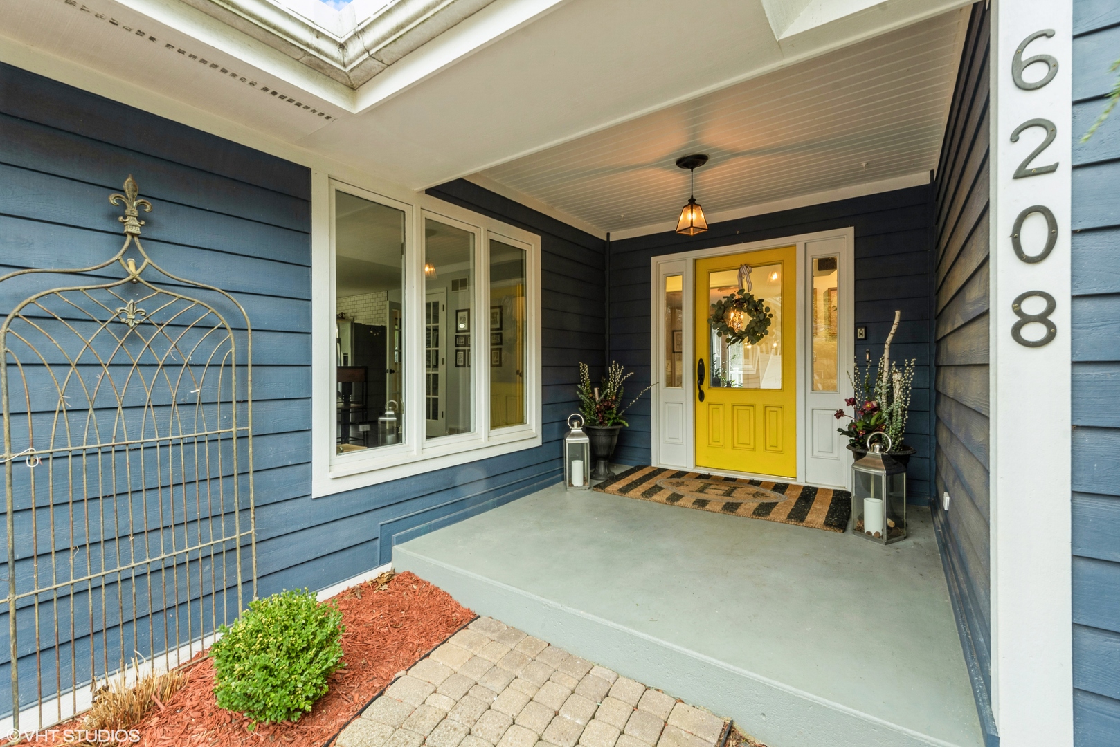 6208 Katmai Trail McHenry, IL 60050 - Photo 3 of 24 a front view of a house with a yard