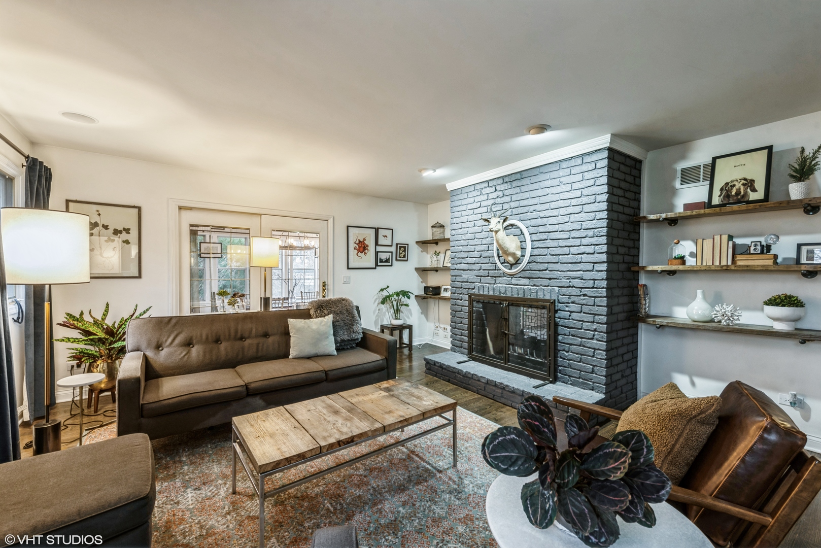 6208 Katmai Trail McHenry, IL 60050 - Photo 7 of 24 a living room with furniture and a fireplace